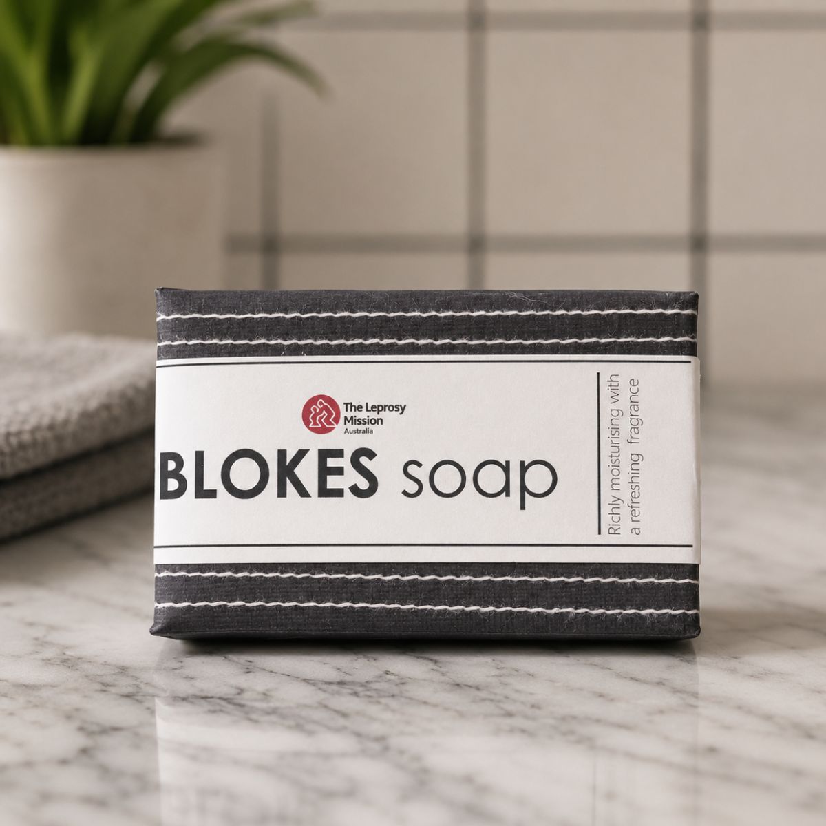Box of Blokes soap on a marble surface with a blurred background