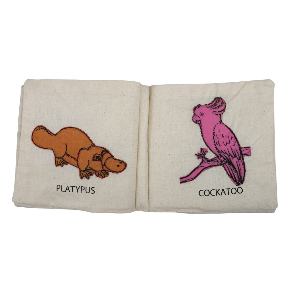Small book with illustrations of a platypus and a cockatoo on beige pages.