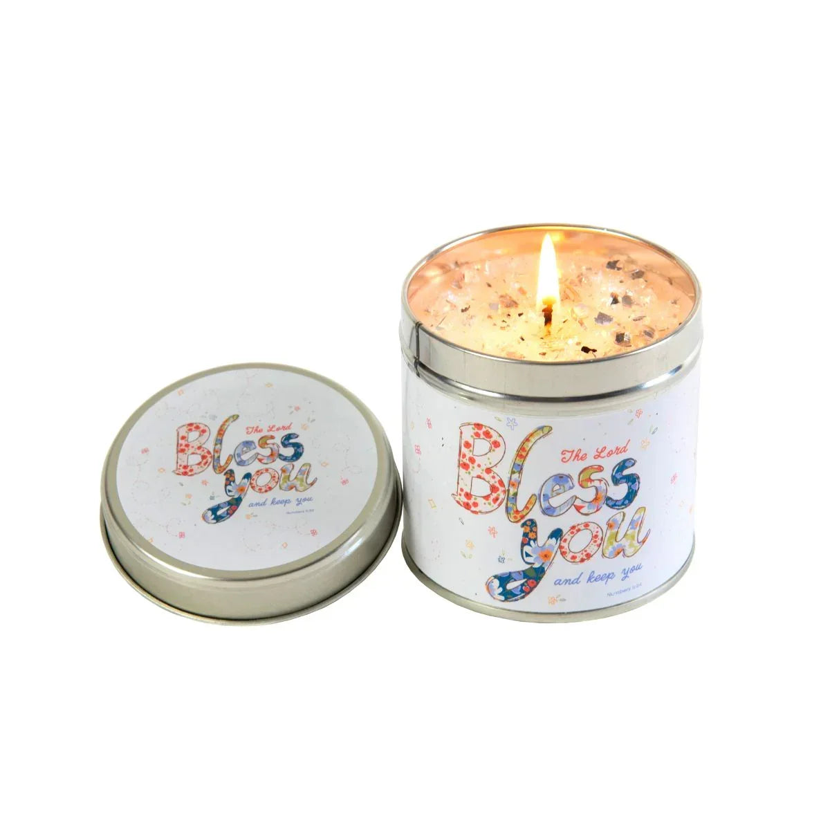 Candle in a tin with 'Bless you' text on a white background
