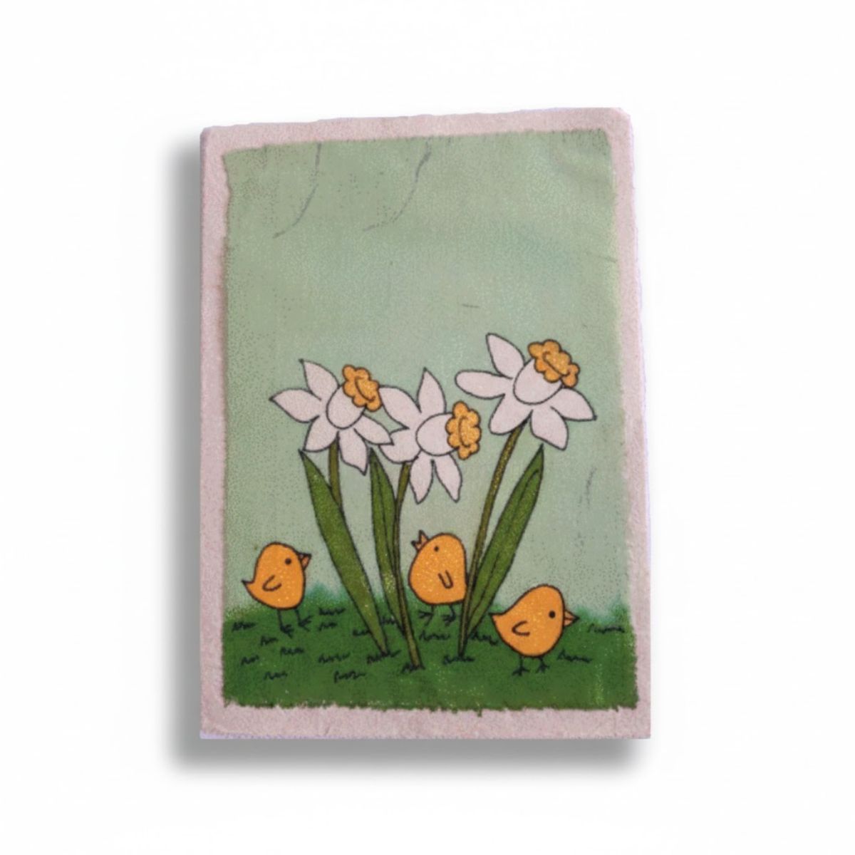 Small fabric pouch with floral and chick design on a green background