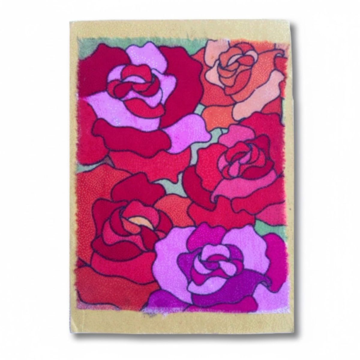 Notebook with colorful rose pattern on a white background