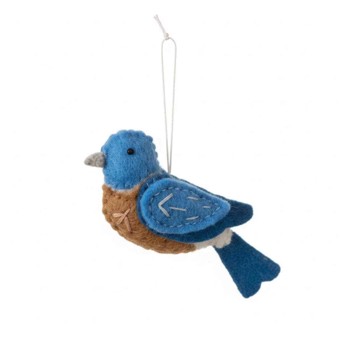 Blue and brown bird-shaped ornament on a white background