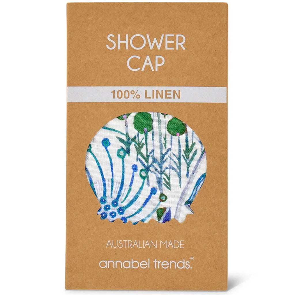Shower cap packaging with linen design on a brown background