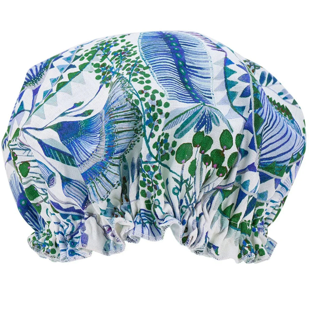 Floral patterned shower cap on a white background