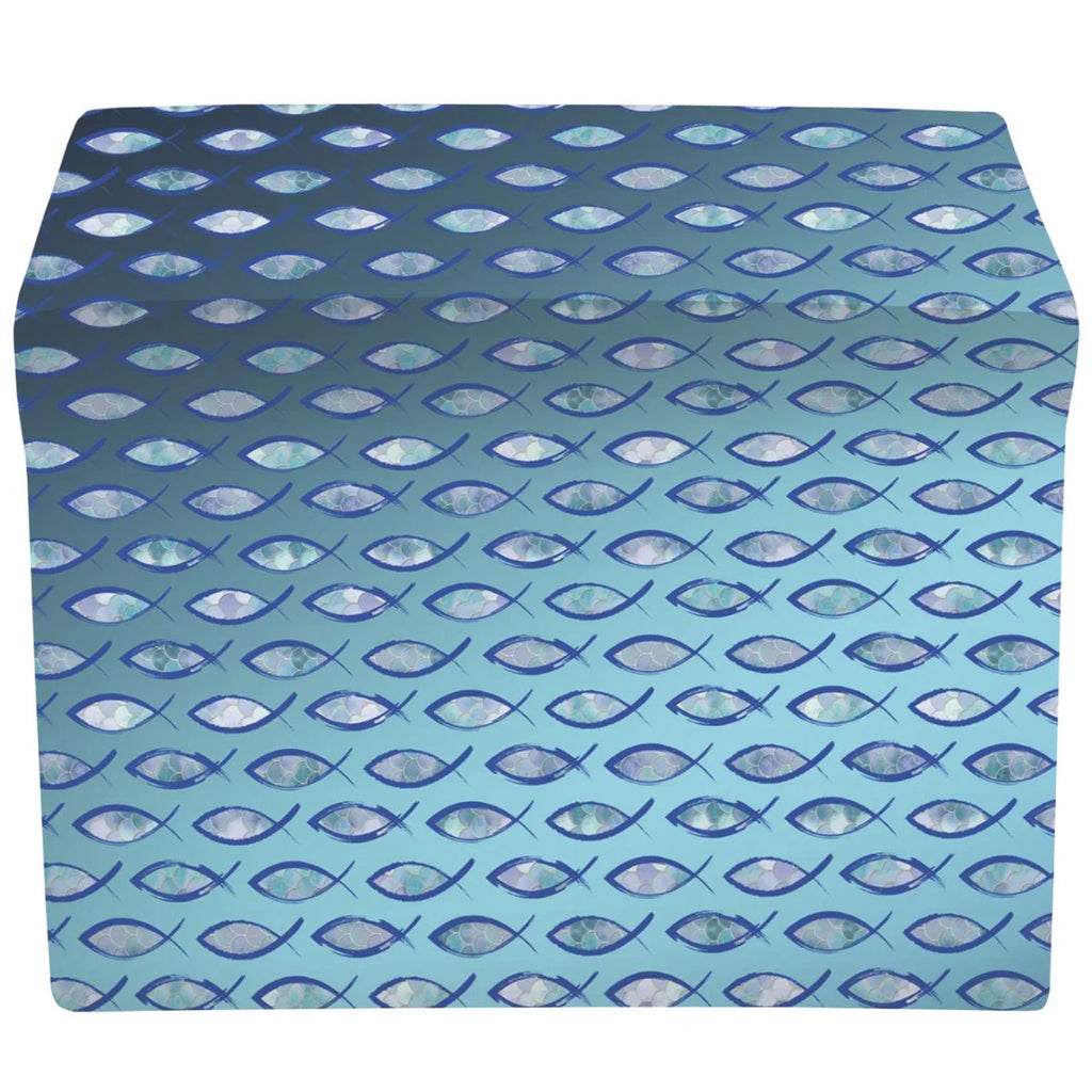 Patterned fabric with blue and white fish design on a blue background