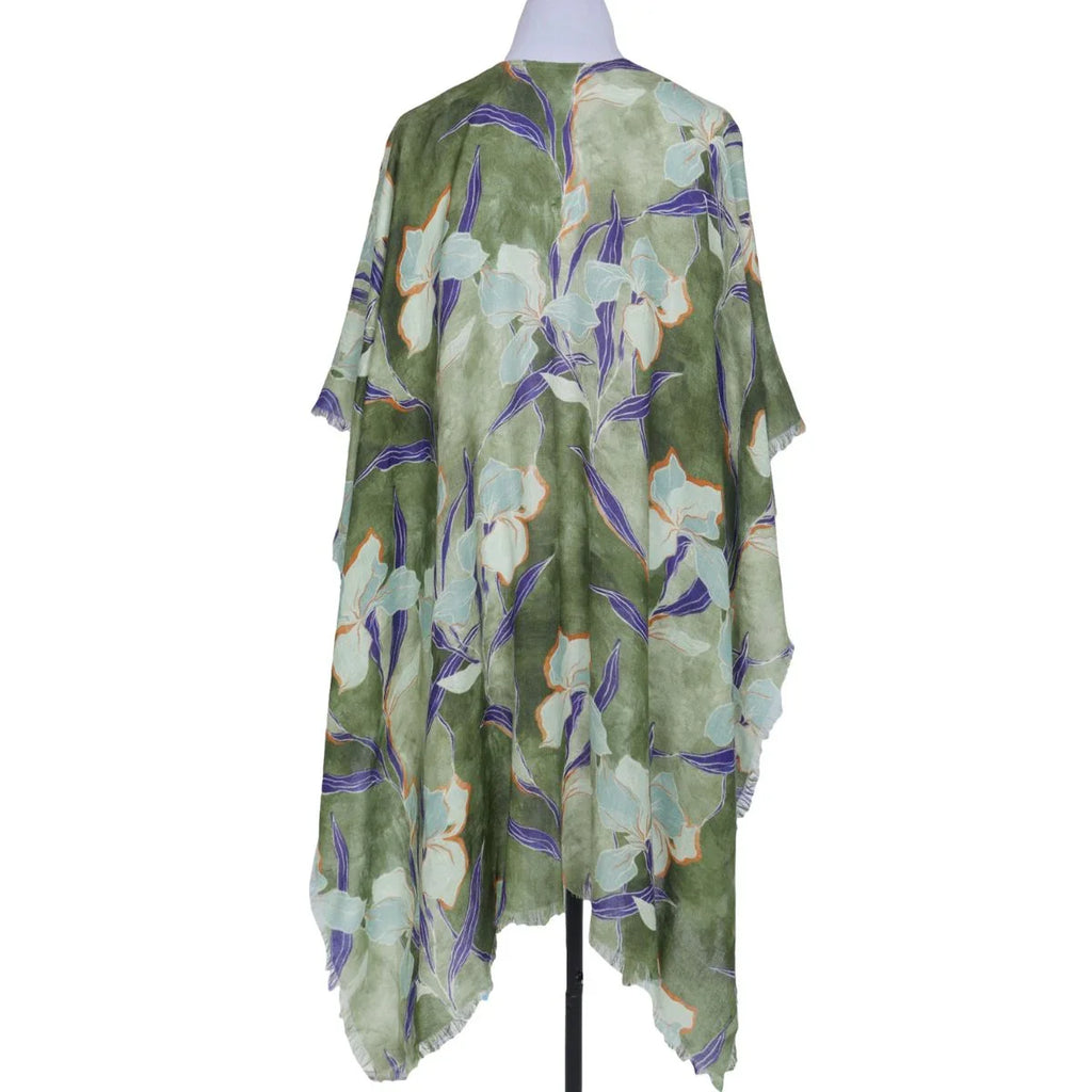 Green floral patterned scarf on a mannequin against a white background