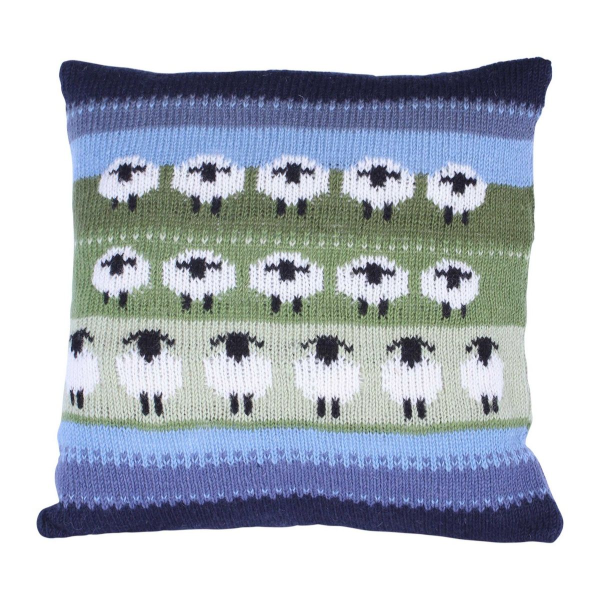 Knitted pillow with sheep pattern on a white background