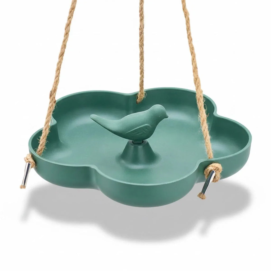 Green bird swing with a bird figure on a white background
