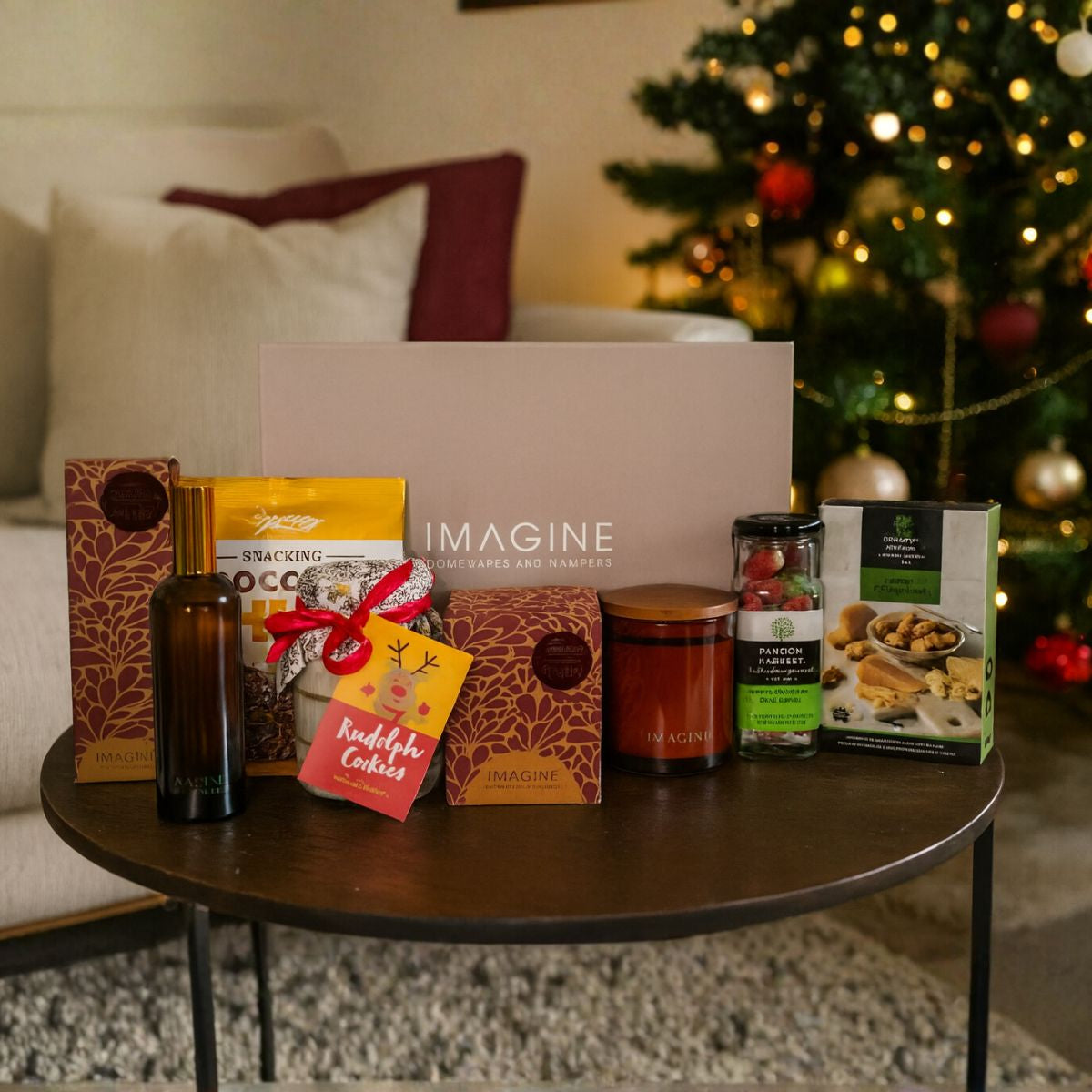 Assorted products on a table with a Christmas tree in the background