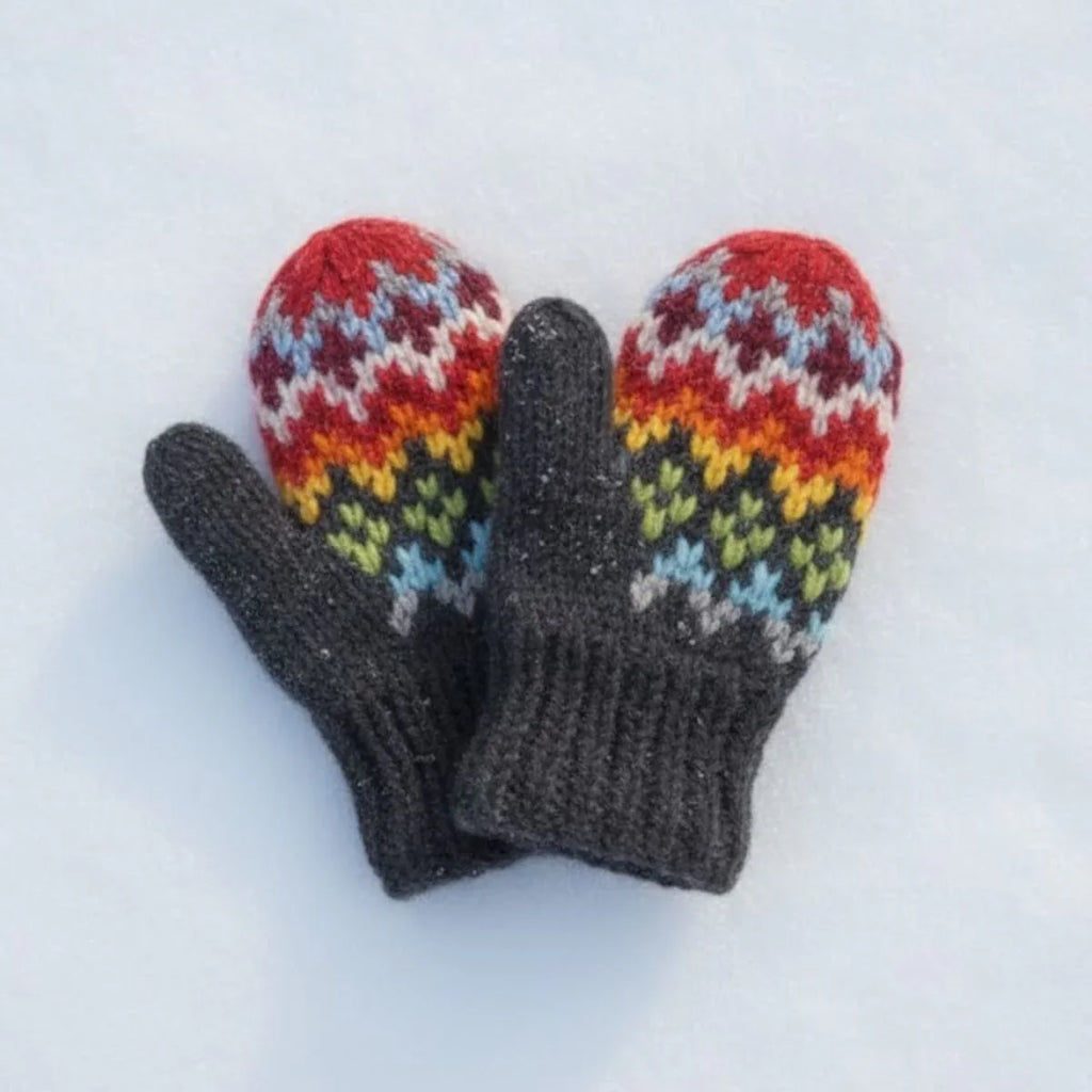Pair of knitted mittens with colorful pattern on a white background