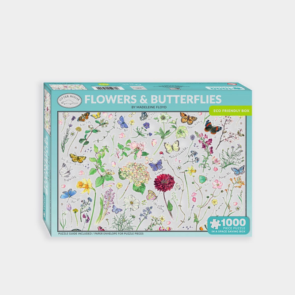Jigsaw puzzle box with floral and butterfly design on a white background
