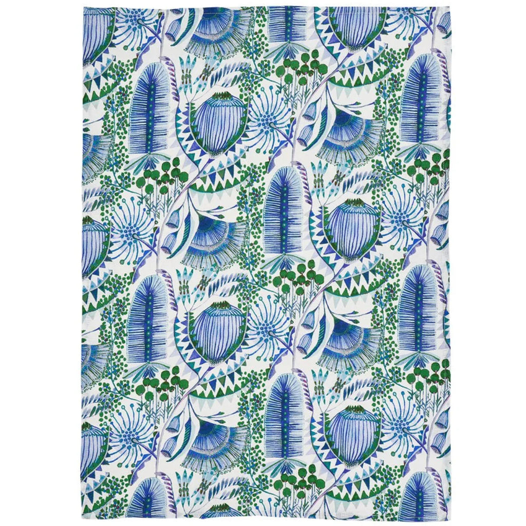 Patterned fabric with blue and green design on a white background
