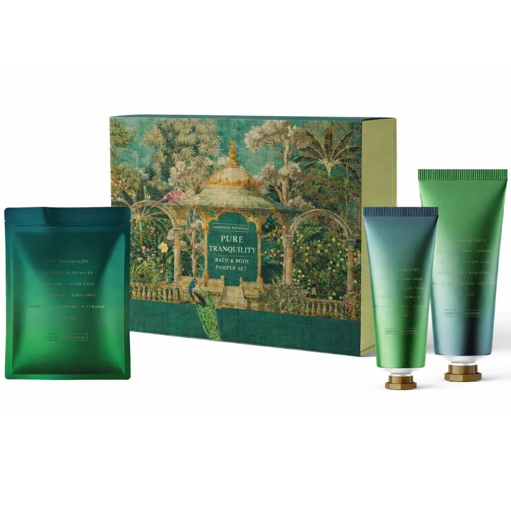 Bath and body set with 'Pure Tranquility' packaging featuring a garden scene.
