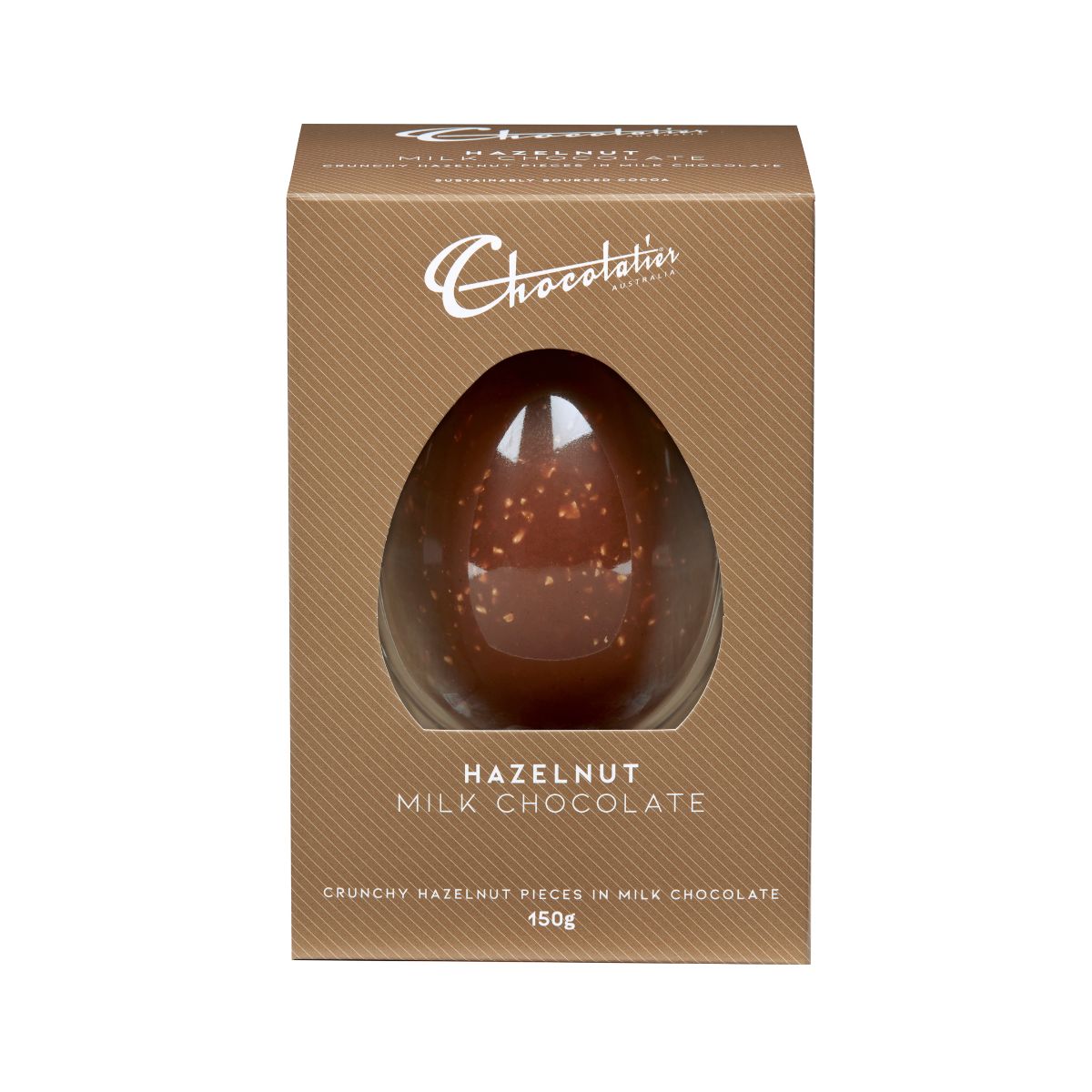 Chocolatier hazelnut milk chocolate egg in a brown box on a white background