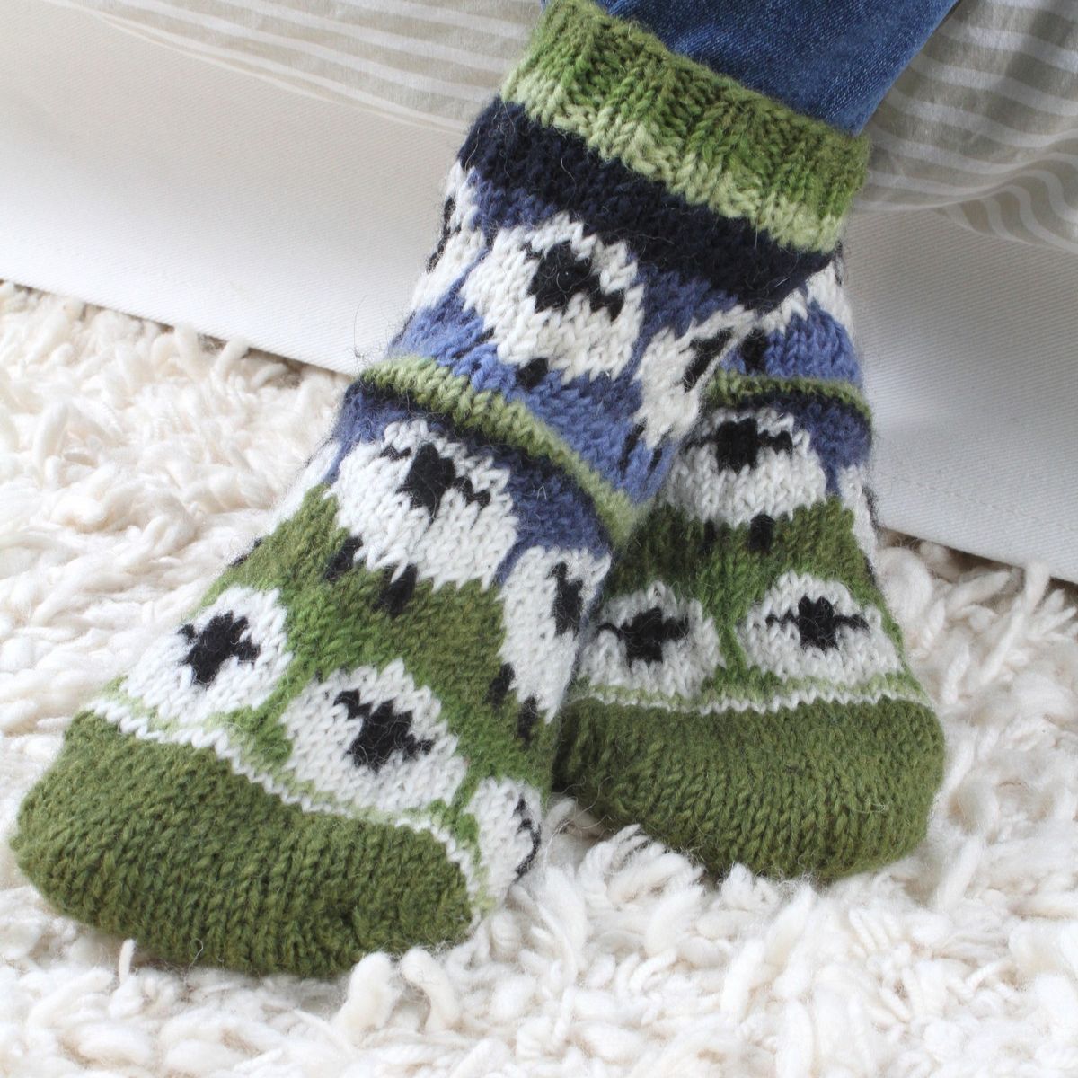Knitted socks with a pattern on a white surface