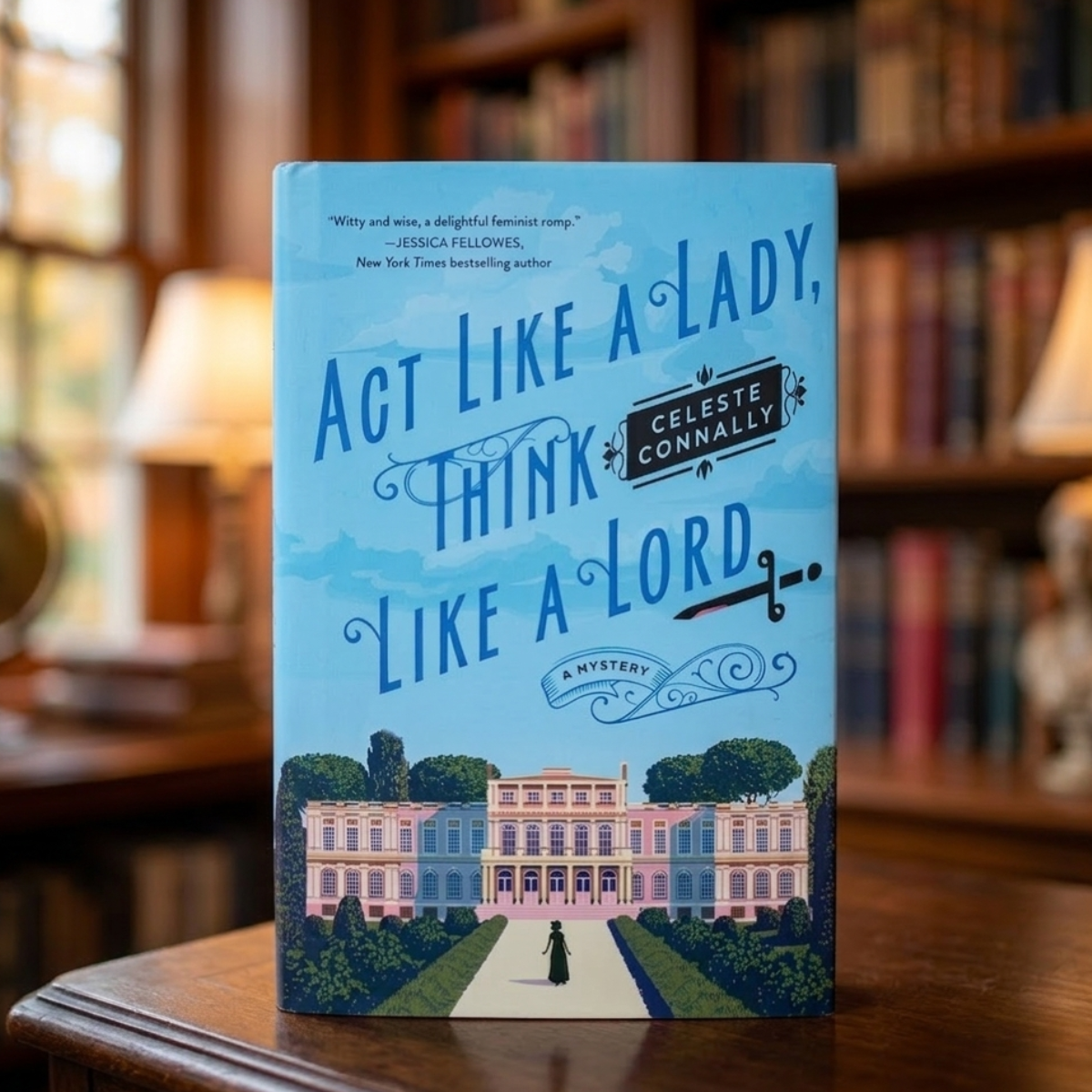 'Act like a Lady, Think like a Lord' hardcover book cover on a table in a home library. 