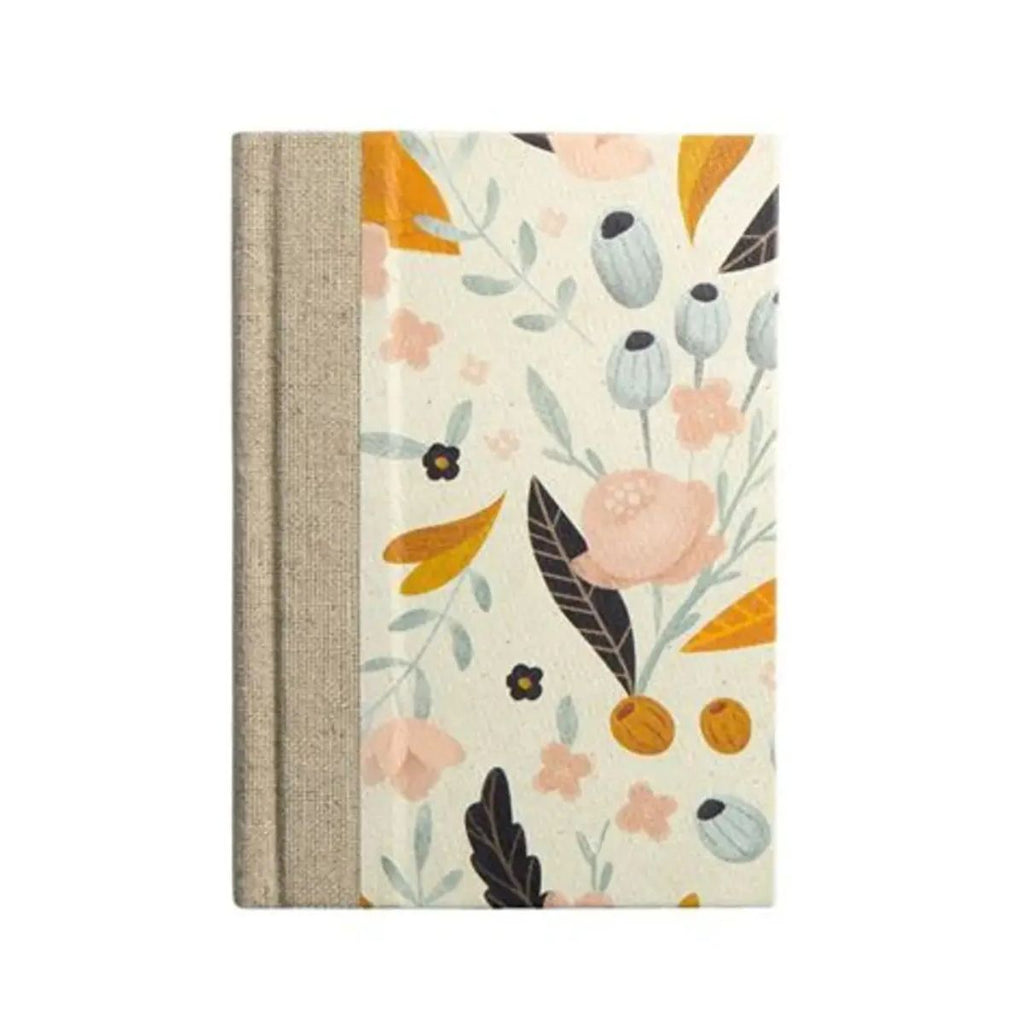 A hardcover notebook with a textured beige linen spine and a cream-colored cover decorated with a floral pattern in orange, pink, gray, and black.