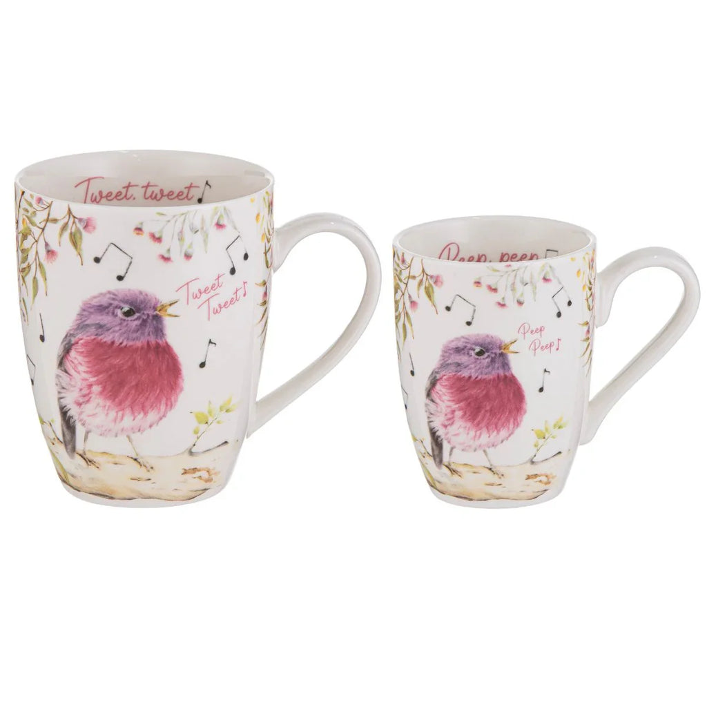Two ceramic mugs with bird illustrations and text on a white background