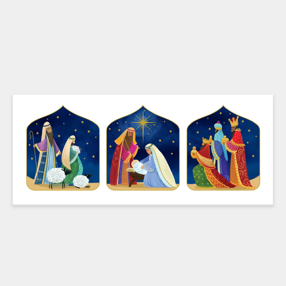A rectangular sticker or print featuring three arched nativity scenes on a white background, shown against a light gray studio backdrop. The central panel shows the Holy Family under a starry night sky, flanked by two panels depicting the Three Wise Men in colorful robes.