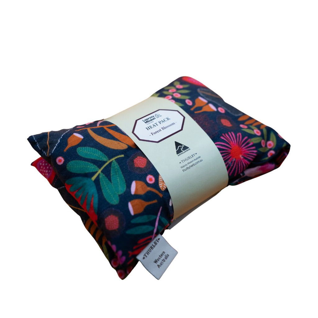 Floral patterned heat pack with visible brand label on a white background