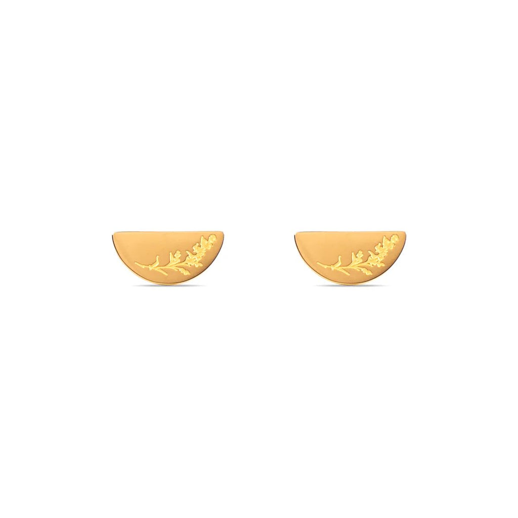 Gold earrings with floral design on a white background