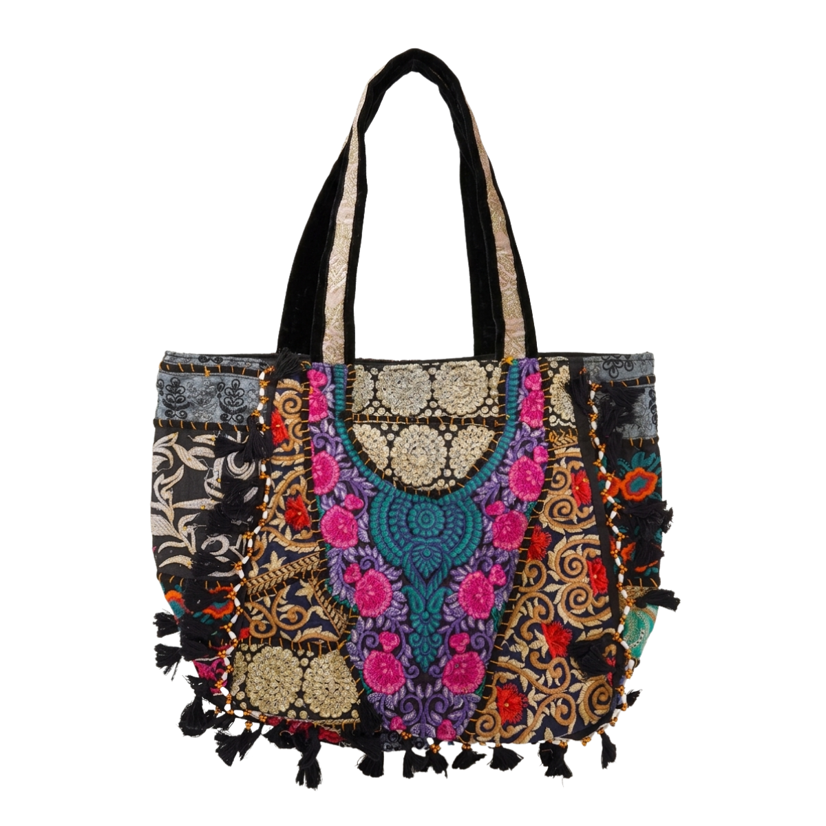 Colorful patchwork handbag with patterns and tassels on a white background