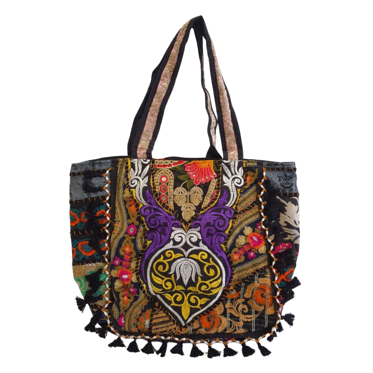 Colorful embroidered bag with tassels on a white background