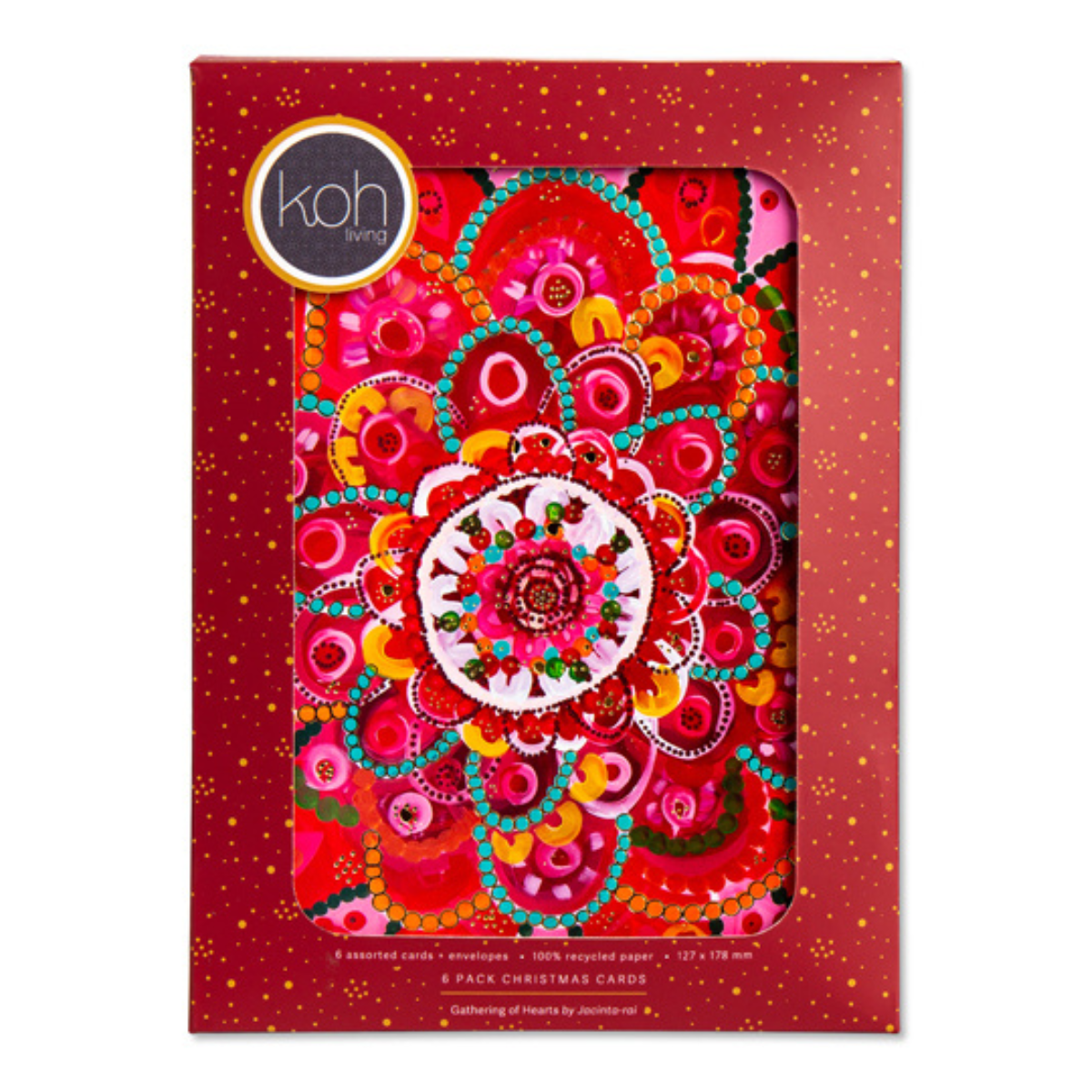 A 6-pack of Christmas cards by Koh Wire, presented in its red window box packaging. The packaging features a gold circular logo and a clear window displaying the colorful card set inside, which showcases a vibrant mandala pattern in red, pink, orange, yellow, and green.