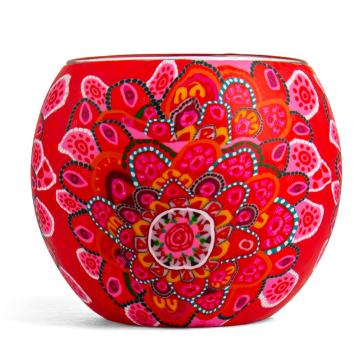 A round red ceramic candle holder decorated with a vibrant, hand-painted Mexican-style floral mandala pattern in pink, orange, and white, set against a plain white background.