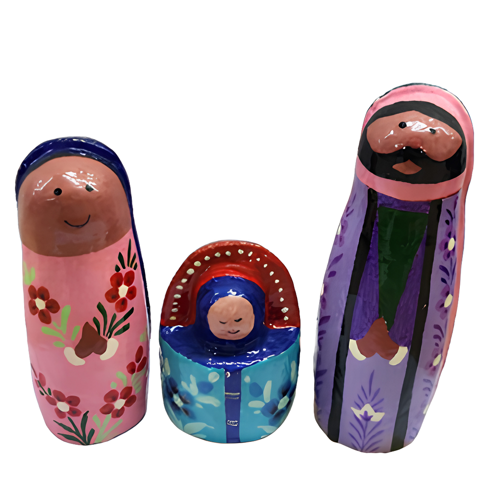 Three hand-painted wooden nesting dolls styled as a family, including a father, mother, and baby, on a plain white background.