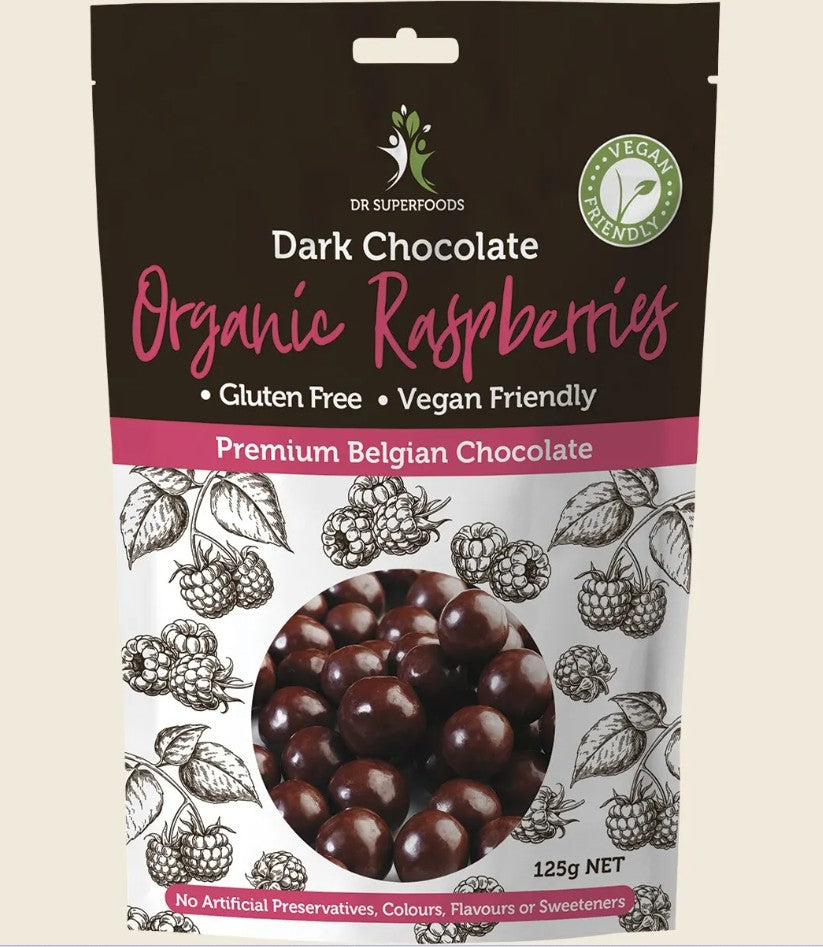 Packaging of Dr Superfoods Dark Chocolate Organic Raspberries on a beige background