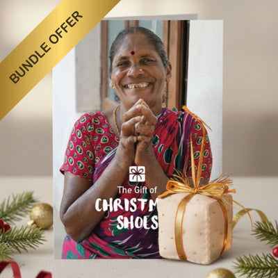 Card with a woman and a gift, featuring 'The Gift of Christmas Shoes' text, with a bundle offer label.
